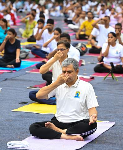 The Union Minister of Railways, Minister of Information and Broadcasting and Minister of Electronics and Information Technology, Shri Ashwini Vaishnaw participates in 10th International Day of Yoga celebrations, in New Delhi on June 21, 2024.