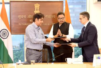 The Secretary, of MIB Shri Sanjay Jaju witnessing the signing of MoU between NFDC and Netflix India